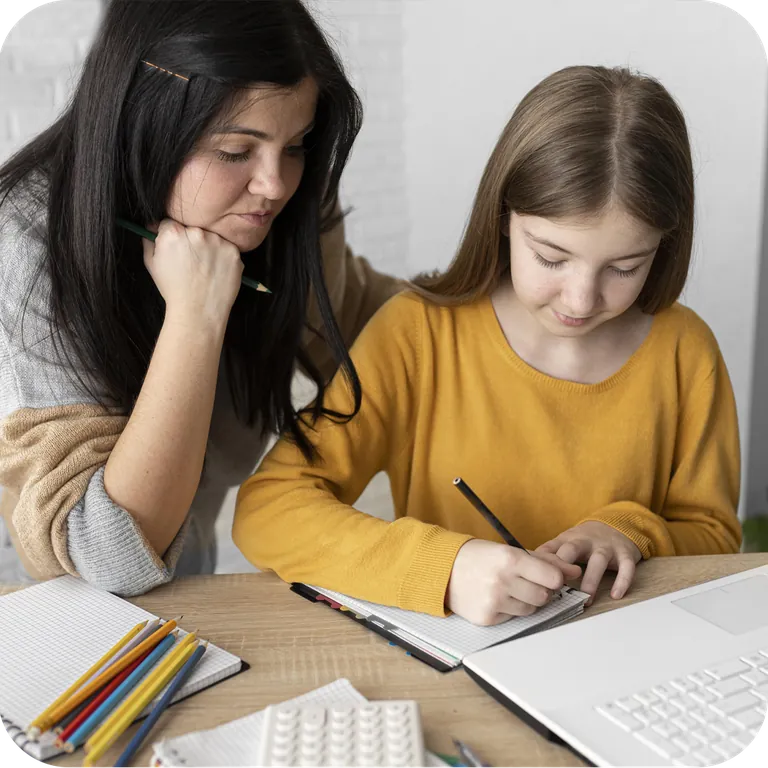 A child learning with guidance from an adult